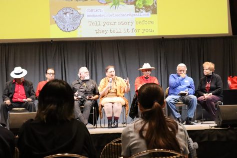 A panel of past MEChA members speaks to students.
