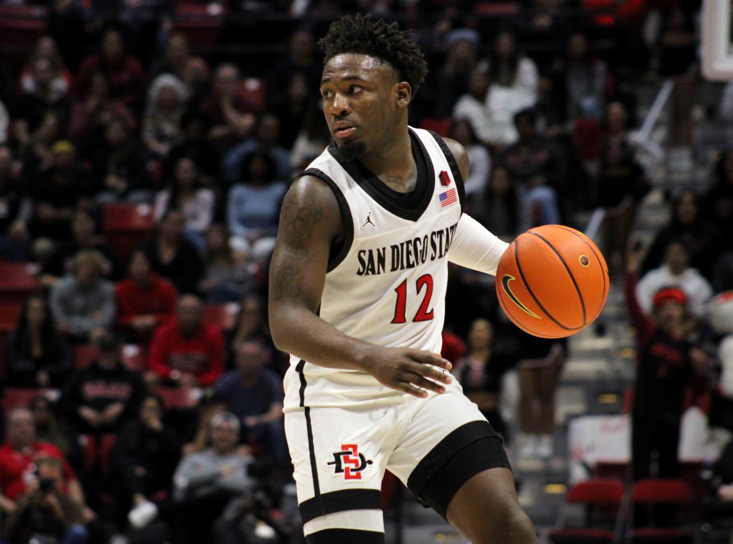 No. 22 San Diego State tightens up its defense to defeat Troy ...