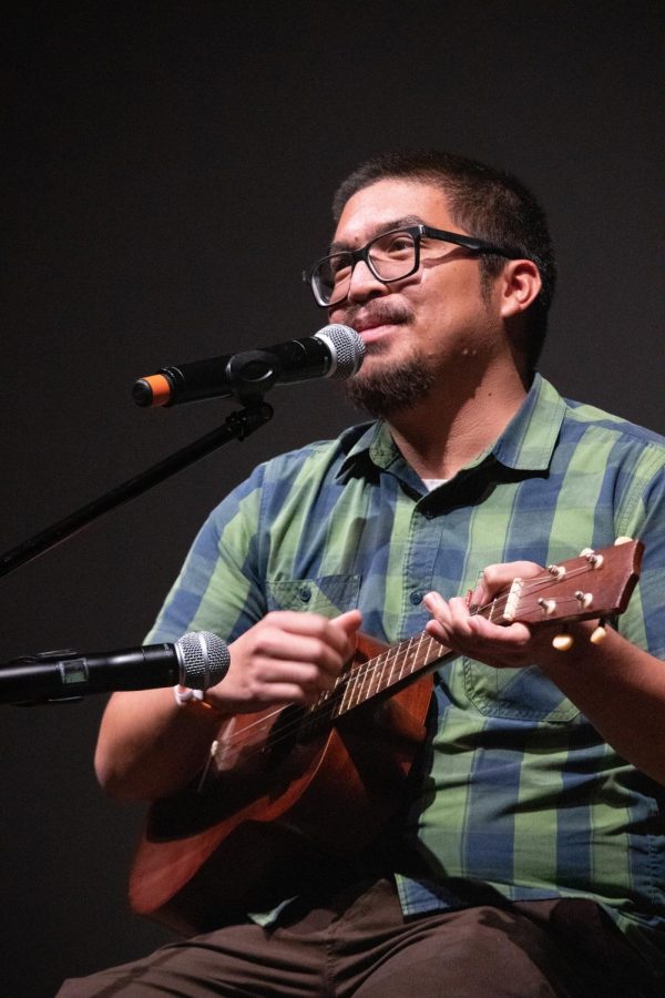 Third year business administration and management & operations student Gabriel Jacob Luansing performs his own song titled Goodbye in the Montezuma Hall Theater on Dec. 6.
