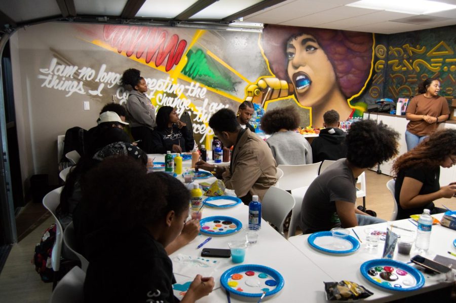 Students paint at the Black Resource Center while engaging in conversations about their experience as Black individuals during Paint Talks on Thursday, February 9.