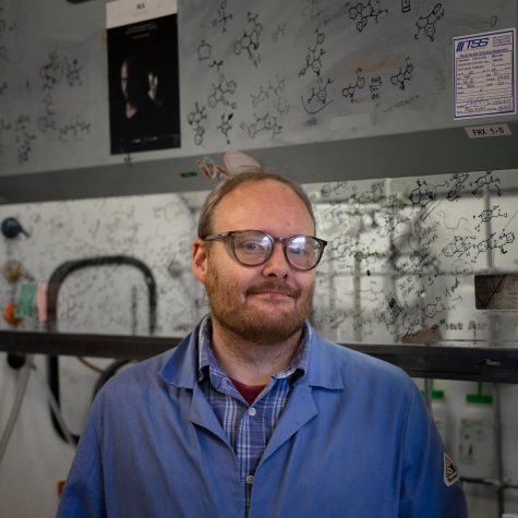 Jeffrey Gustafson, organic chemistry professor and chemical biologist at SDSU, poses for a photo in his lab on Fe. 2, 2023.