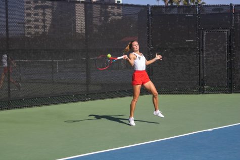 SDSU senior Dariya Detkovskaya hits a ball back to her opponent's side.