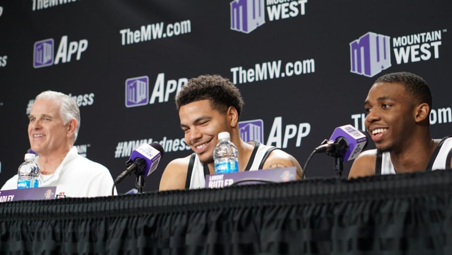 SDSU head coach Brian Dutcher, senior Matt Bradley and junior Lamont Butler crack a smile during the post-game press conference after defeating Colorado State University.