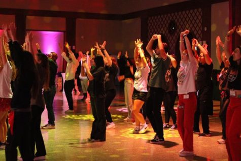 Dance Marathon participants groove on the dance floor in the late hours of the event. 