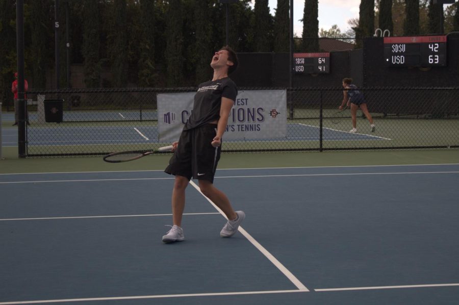 Junior Andjela Skrobonja celebrates winning a point during her singles match versus USD.
