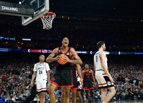SDSU senior Keshad Johnson yells after being fouled during SDSU's 76-59 loss to UConn in the National Championship on Monday, April 4.
