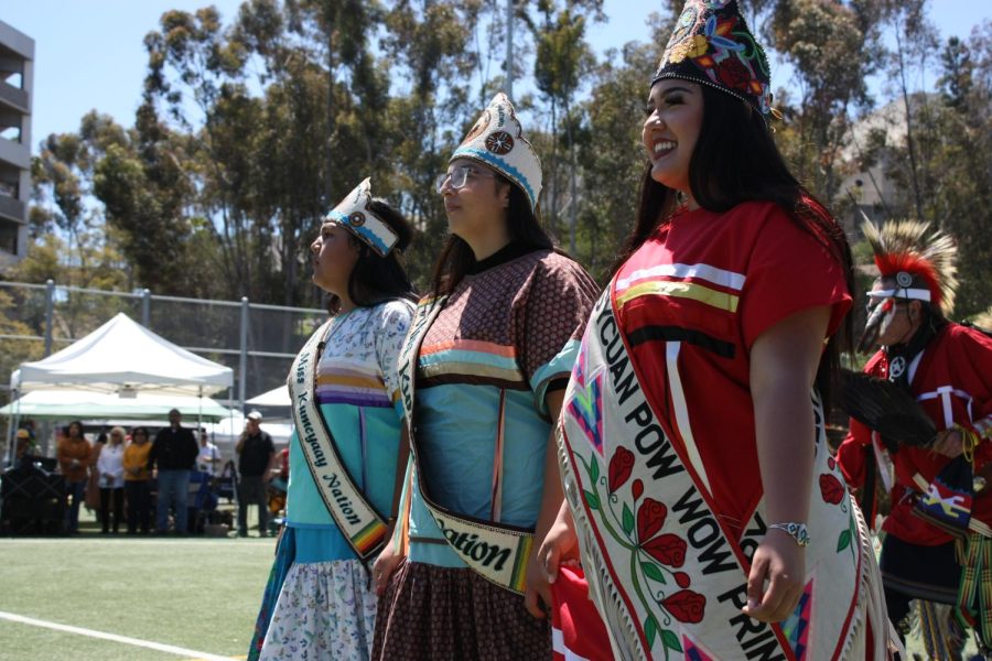 Little Miss Kumeyaay Nation, Miss Kumeyaay Nation, and the Sycuan Pow Wow Princess for 2023 stand as representatives of their tribes at the 2023 SDSU Pow Wow on Saturday, April 8.
