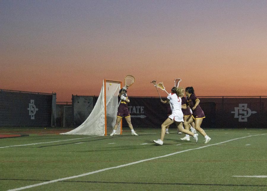 Senior attack Caitlin Jones scores a goal in a game versus Arizona State on April 21. 