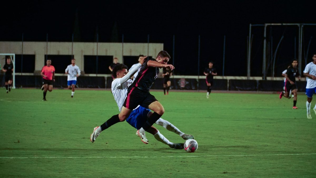 San Diego State forward Rommee Jardily maintains possession against a UC Riverside defender on Sunday, Sept. 10th at the SDSU sports deck. Jaridly scored the first goal of the game, and his third overall. 