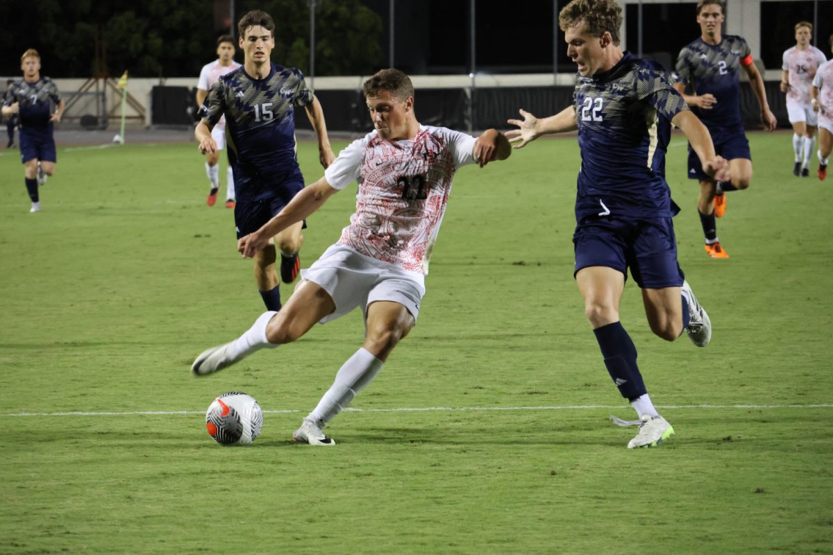 San Diego State forward Rommee Jardily strikes the ball against George Washington on Friday, Sept. 8 at the SDSU Sports Deck. Jaridly scored his second goal of the season in the match.