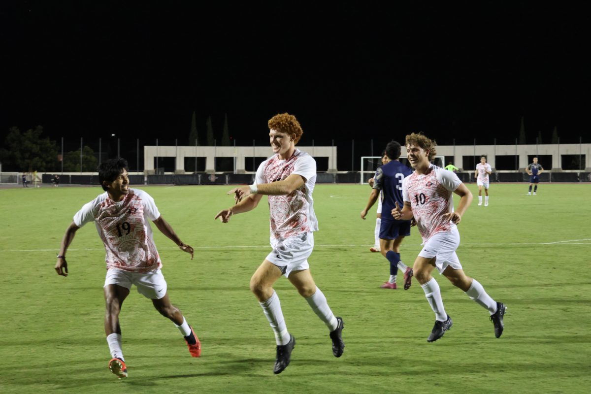 San Diego State defender Reid Fisher (center) celebrates his goal with Owen Zaldivar (19) and Austin Brummett (10) in the Aztecs 3-0 win over George Washington on Friday, Sept. 8 at the SDSU Sports Deck.