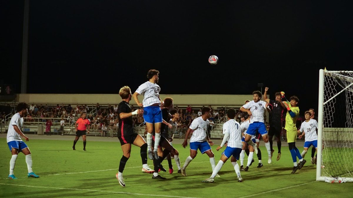San Diego State defender Lorenzo Hernandez (far right) among San Diego State and UC Riverside defenders as the ball gets popped up in the air. 