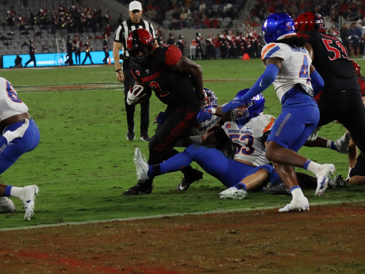 San Diego State running back Jaylon Armstead (2) breaks several tackles to make it into the endzone on Friday, Sept. 22 at Snapdragon Stadium.