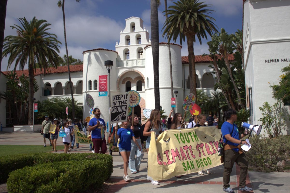 The march continues past Hepner Hall (above). 