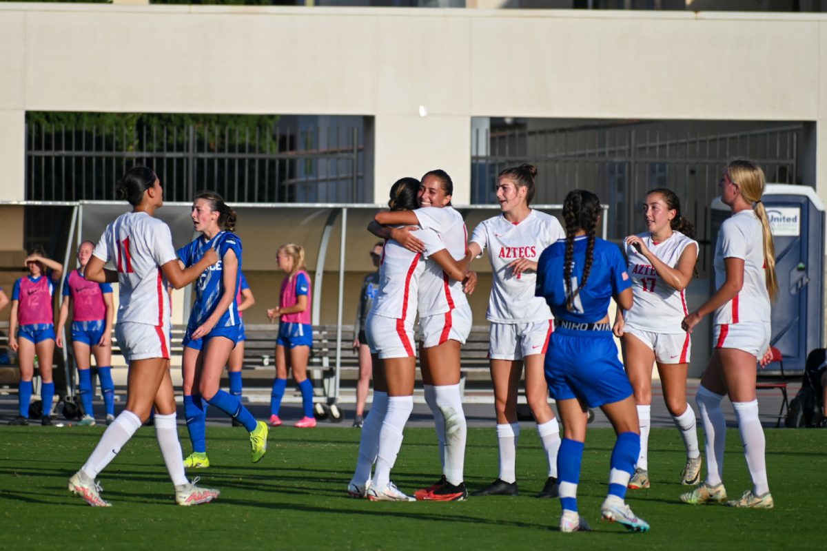 San Diego State celebrates with midfielder Alyza Eckhardt after her goal against Air Force on Thursday, Sept. 28 at the SDSU Sports Deck. The Aztecs beat the Falcons 1-0 on Eckhardts first goal of the season.