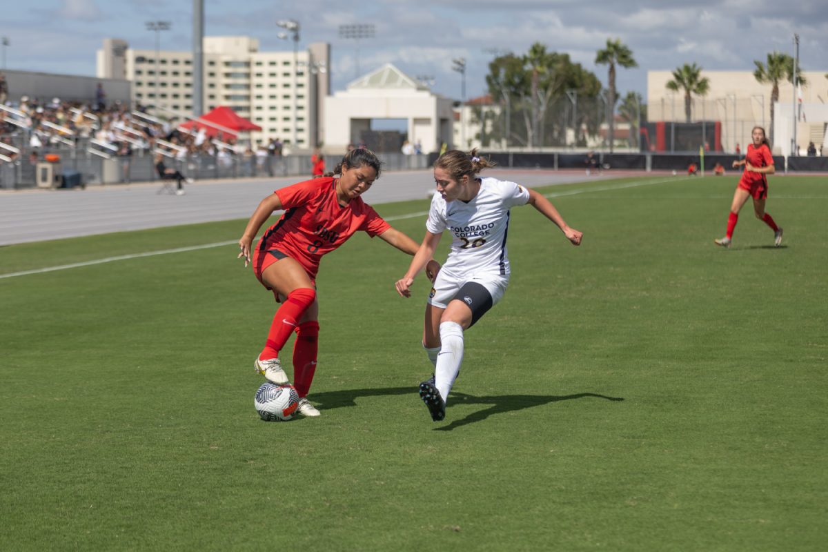 San Diego State midfielder Alexys Ocampo takes on Colorado College defender Ava Risser during the Aztecs 3-1 win on Sunday, Oct. 1 at the SDSU Sports Deck. Ocampo scored her first goal of the season during the match.