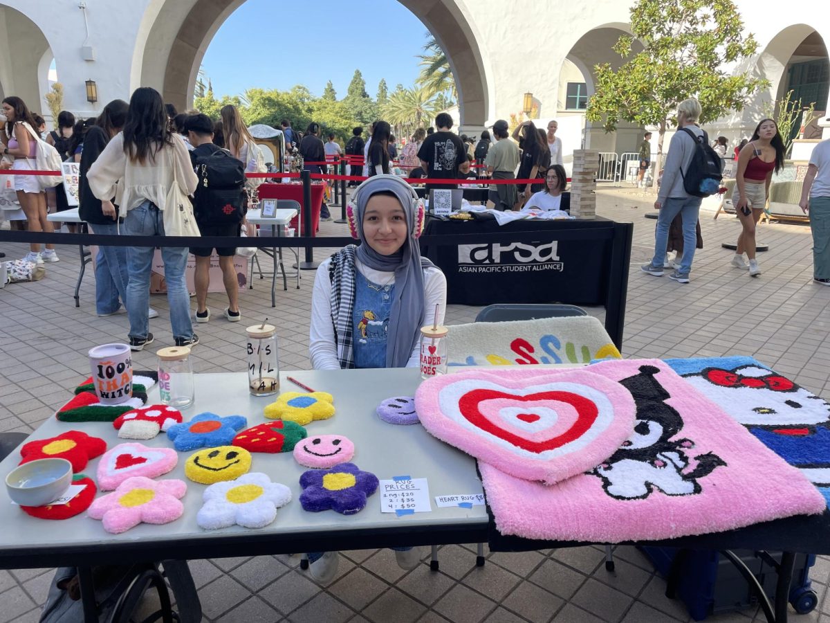 Yaya Khatib (24) sold handmade rugs from her store Yassuck at the Makers Market in the Aztec Student Union on Oct. 18.