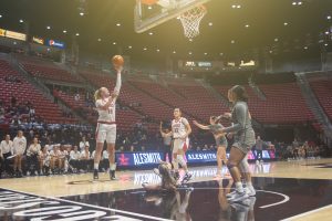 San Diego State guard Abby Prohaska (24) rises for a shot earlier this season at Viejas Arena.