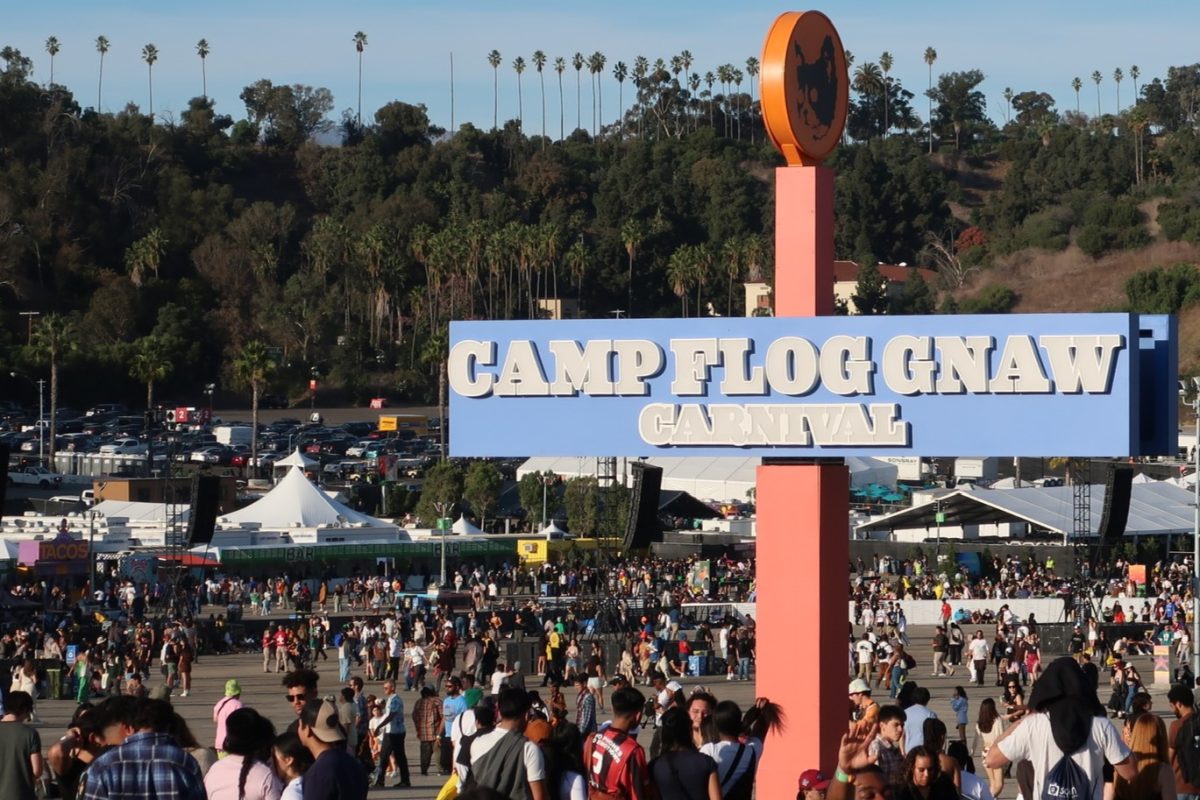 A sign reading Camp Flog Gnaw Festival welcomes attendees at the entrance to the festival. Photo courtesy of Amara Obijaku