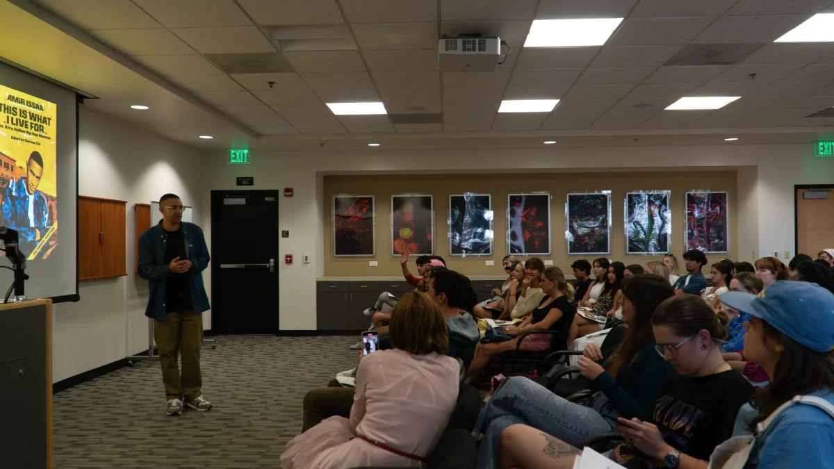 Amir Issaa hosts a Q&A session at SDSU after presenting the bilingual version of his book, This is What I Live For, on Oct. 31.