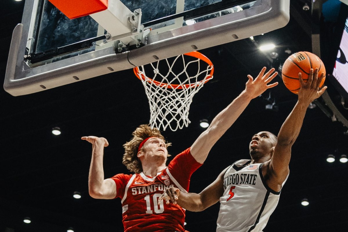 San Diego State guard Lamont Butler attacks the rim against Stanford forward Max Murrell on Thursday, Dec. 21 at Viejas Arena. The Aztecs finished their home non-conference schedule with a 6-0 record following the 74-50 win.