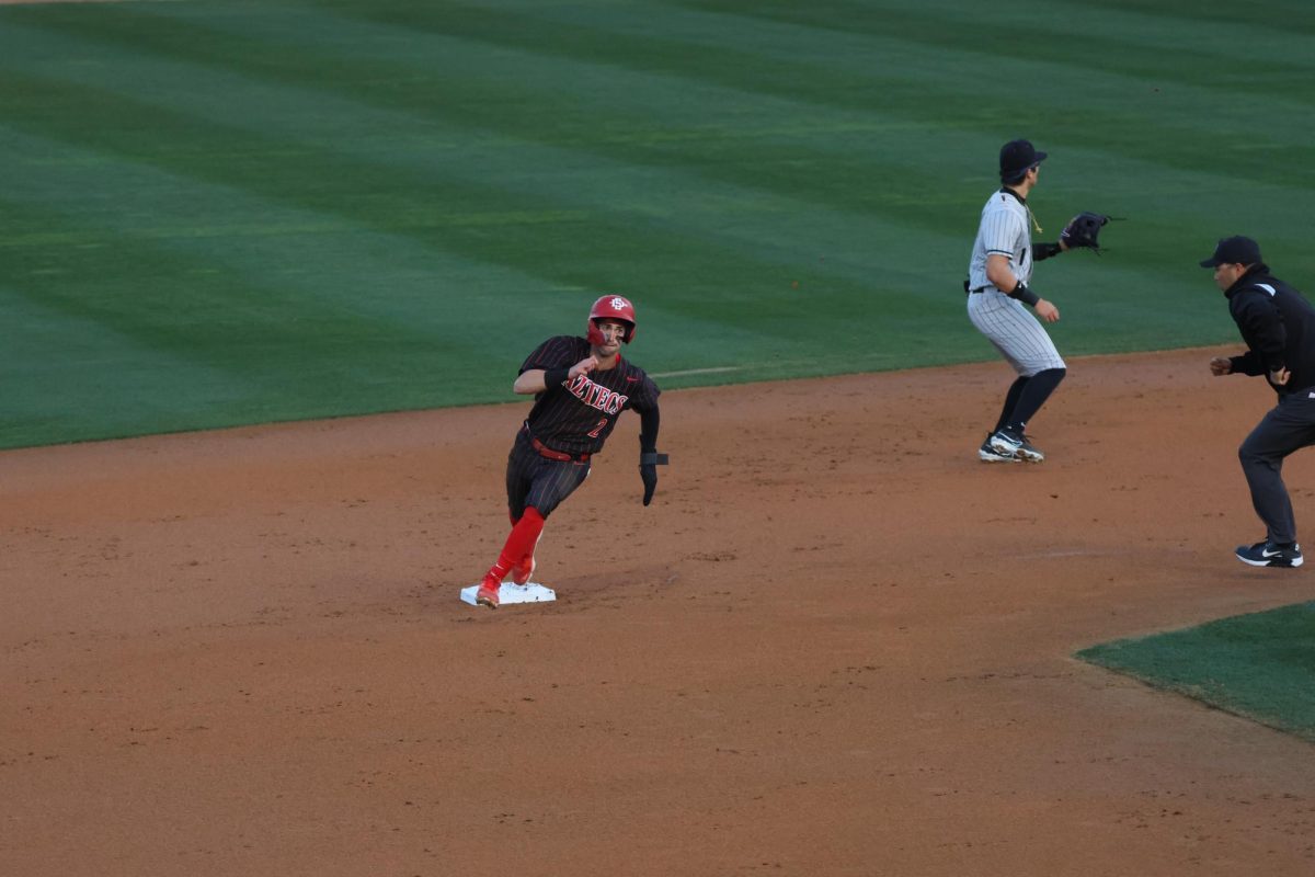 San Diego State outfielder Shaun Montoya   running past base during an inning against Portland on Sunday, Feb. 18 at Tony Gwynn Stadium. Montoya scored the first run for the Aztecs that helped defeat the Pilots 7-1.  