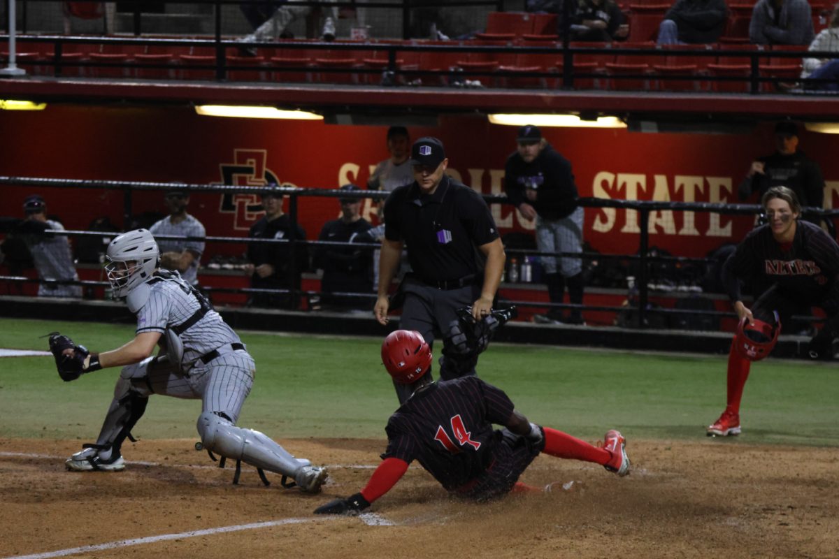 San Diego State outfielder Irvin Weems slides home safely during the eighth inning against Portland on Friday, Feb. 16 at Tony Gwynn Stadium. The Aztecs rallied late, but fell to the Pilots 5-4 on Opening Day.