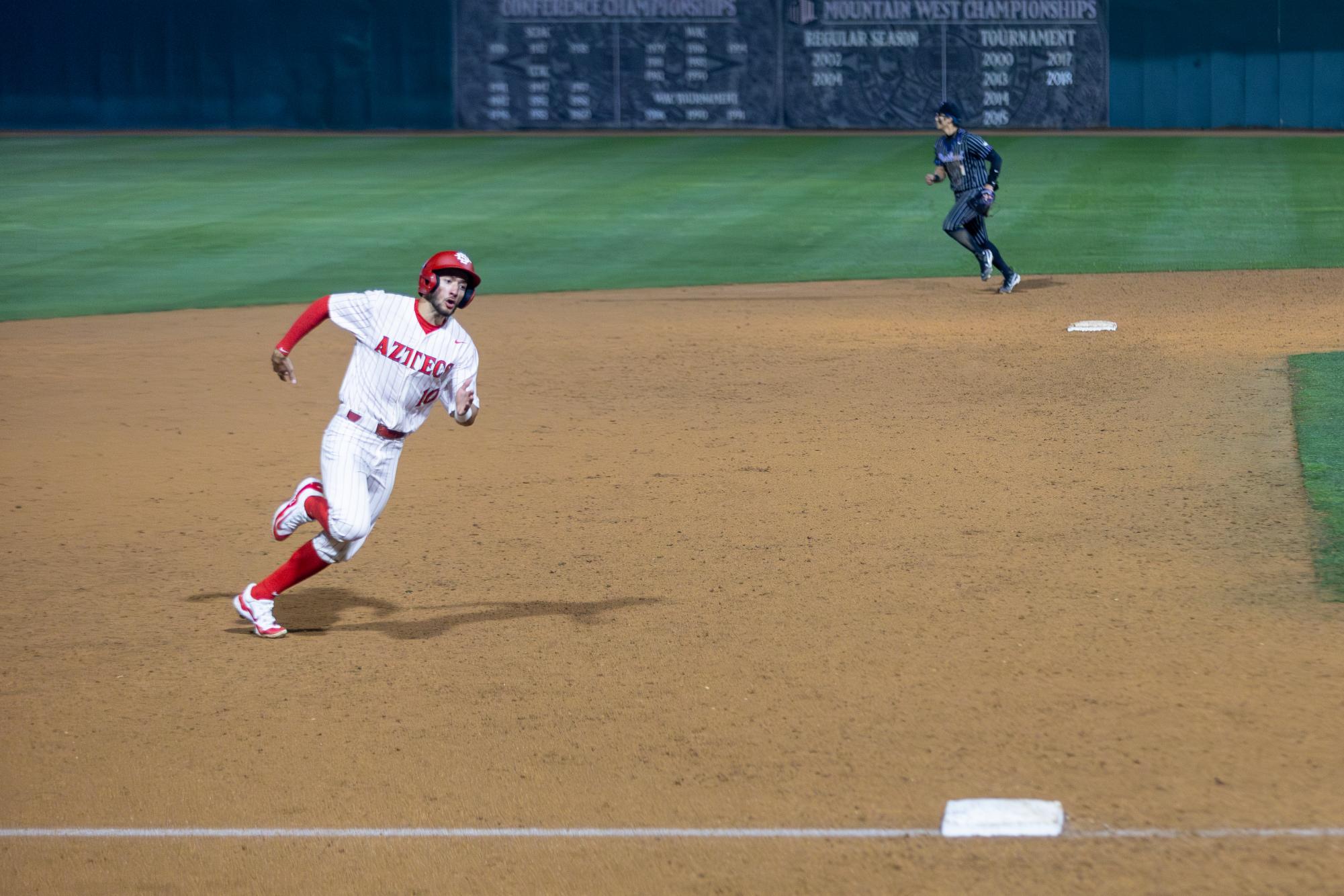 San Diego State infielder Tino Bethancourt runs to home base late in the game during the 7-6 loss against Portland on Saturday, Feb. 17. at Tony Gwynn Stadium. 