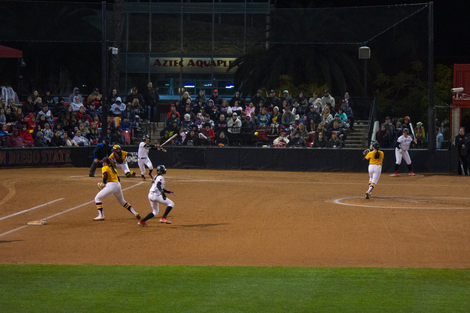 San Diego State infielder Micaela Macario hits the ball earlier this season at the SDSU Softball Stadium. Macario has gone 5 for 10 with a home run, three runs scored and two stolen bases in the Aztecs first three wins at the Mary Nutter Classic.