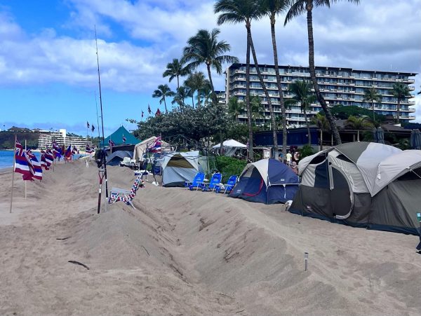 Tents line Kaanapali Beach in Lahaina, Hawaii, as part of a protest advocating for dignified housing following the Aug. 8 Maui wildfires, on Dec. 11, 2023.