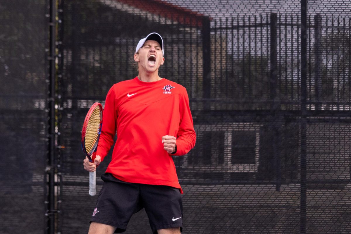 Aztec senior Johannes Seeman celebrates a point during singles competition against LMUs Yassine Smiej at the Aztec Tennis Center on Feb. 29, 2024. Seeman led Aztec victories in his doubles and singles matches.