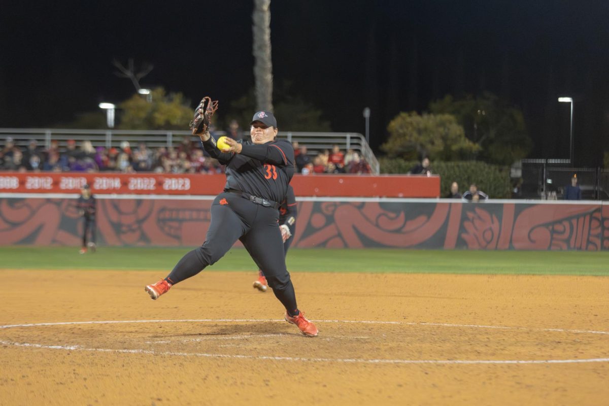 San Diego State utility Dee Dee Hernandez catches a ball on a play at the mound earlier this season at SDSU Softball Stadium. Hernandez helped pitch the last remaining innings in the 3-0 win against Illinois on Sunday, Mar. 3rd. 