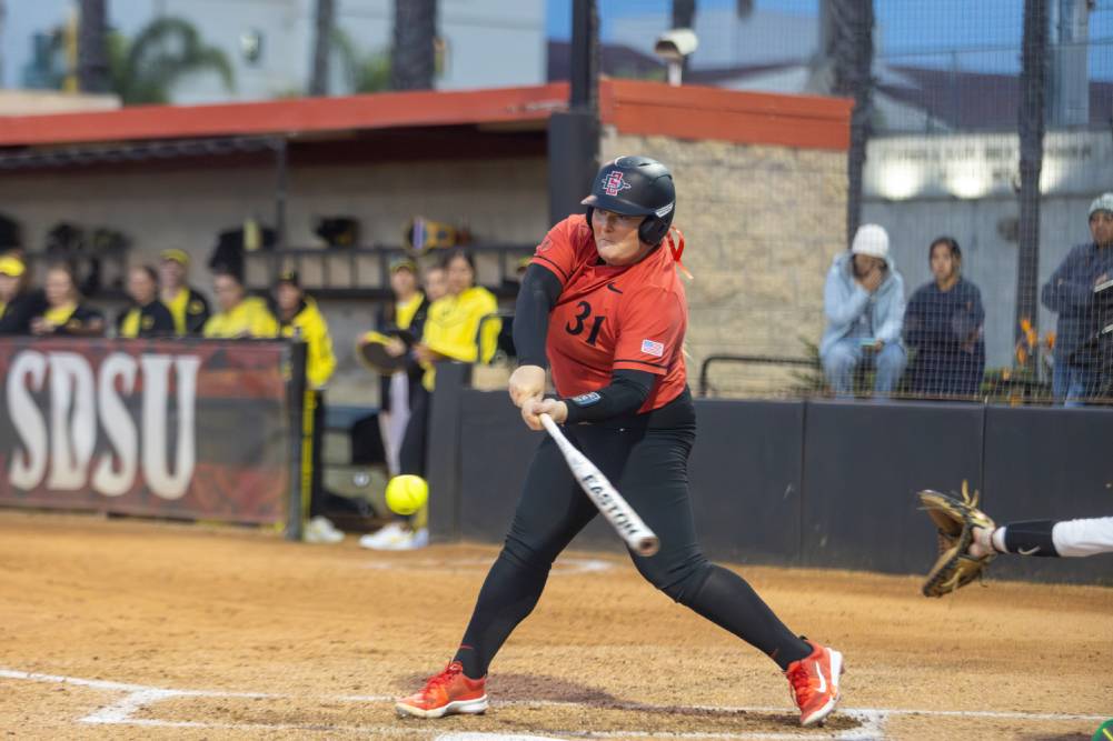 San Diego State utility Mac Barbara swings at bat during an inning earlier this season against Oregon. Barbara had a run in the fifth inning against McNeese in the first of two back to back games in the Purple & Gold Challenge. 