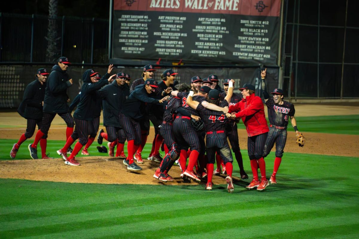 The San Diego State baseball team celebrates the win over New Mexico at Tony Gwynn Stadium after right handed pitcher Jacob Riordan pitched the ninth no-hitter in program history. The Aztecs ended the series with a 13-0 shutout win over the Lobos. 