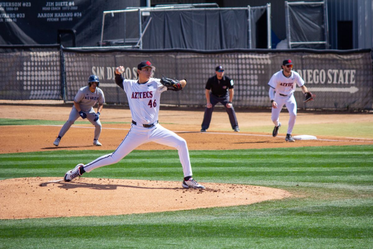 San Diego State starting pitcher Xavier Cardenas III delivers the pitch with a man on base on Sunday, March 10 at Tony Gwynn Stadium. Cardenas III went 4.2 innings with four strikeouts and allowed five hits, four runs (all earned) and five walks.