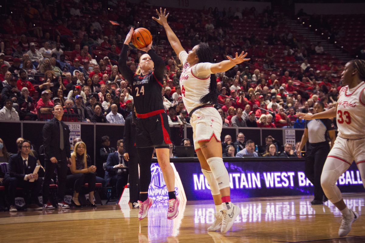 San Diego State guard Abby Prohaska takes a jump shot over UNLV forward Alyssa Brown on Wednesday, March 13 at the Thomas & Mack Center in Las Vegas. The Aztecs advanced to the semifinals and the final of the Mountain West Championships in Prohaskas two years at SDSU.