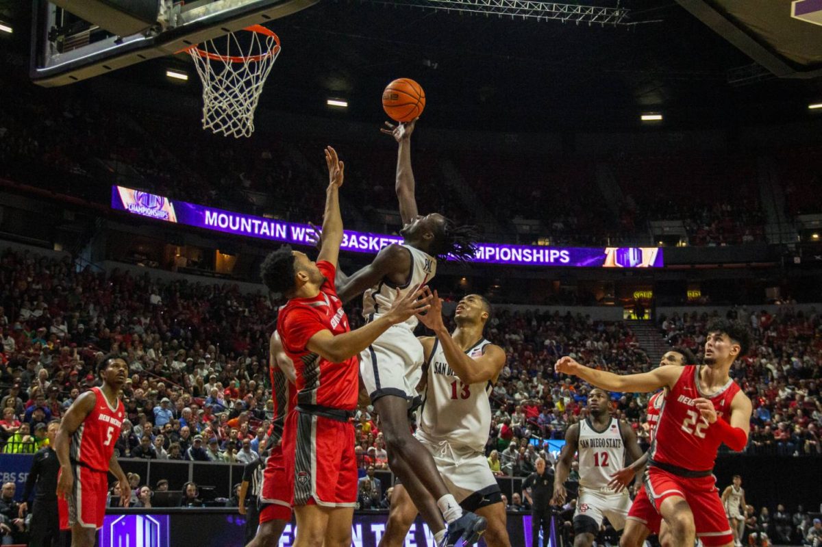 San Diego State forward Jay Pal jumps above in front of a New Mexico defender to attempt a shot in the paint earlier this season at Thomas & Mack Center. Pal had five points in the Sweet 16 loss against UConn 