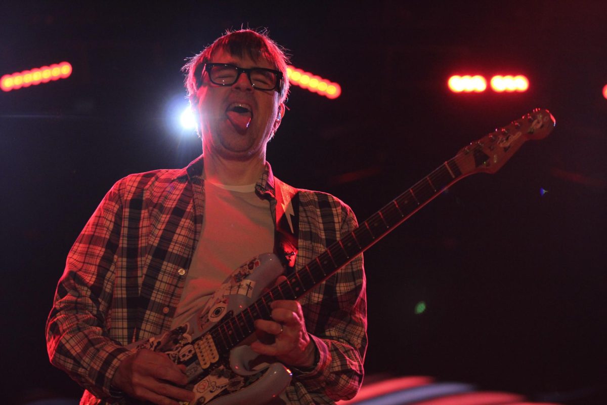 Weezer’s lead singer Rivers Cuomo plays his guitar on the main stage at Wonderfront 2024 on May 11.