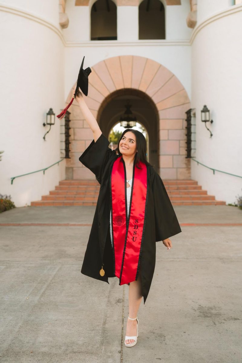 Jazlyn Dieguez celebrates in her cap and gown at Hepner Hall on May 8, 2024. (Photo courtesy of Katie Carozza)