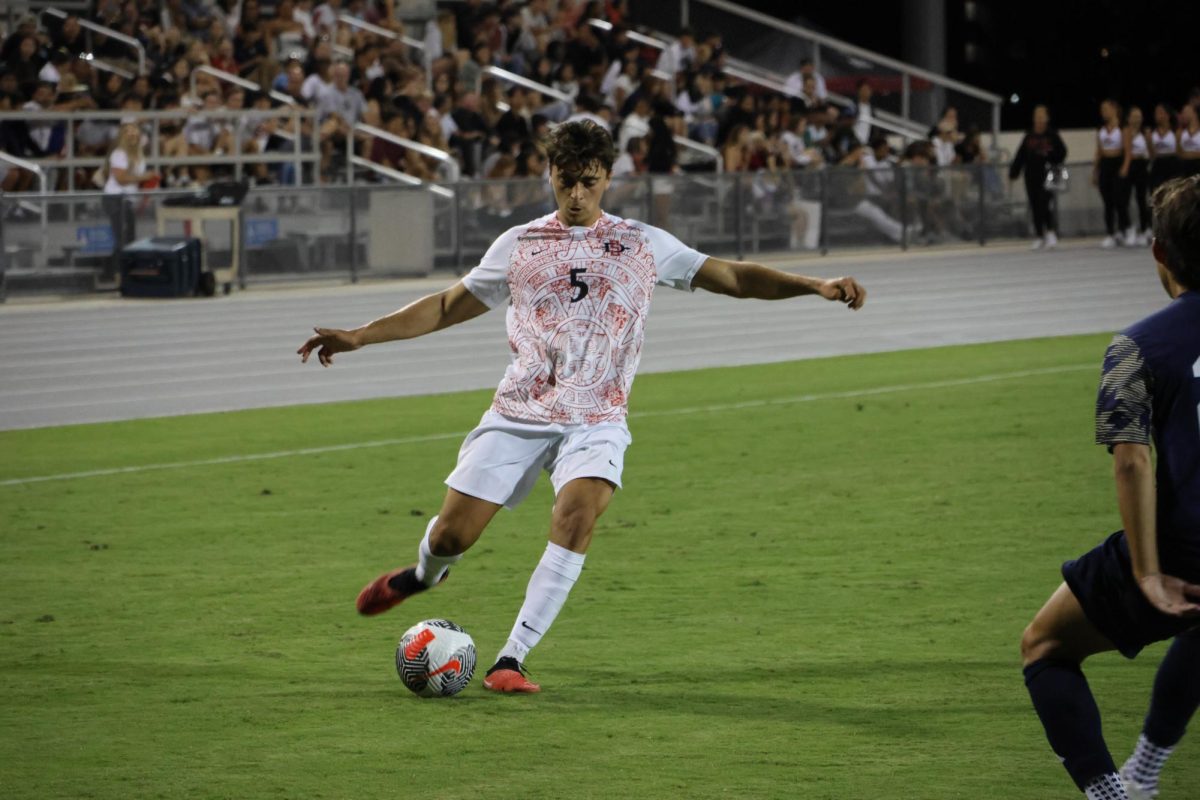 Noah Crétier lines up a pass to an open teammate against George Washington on Sept. 8, 2023. 