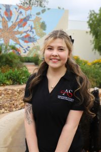 Associated Students President Katarina Hernandez poses in SDSUs Native and Indigenous Healing Garden, Courtesy of Associated Students.