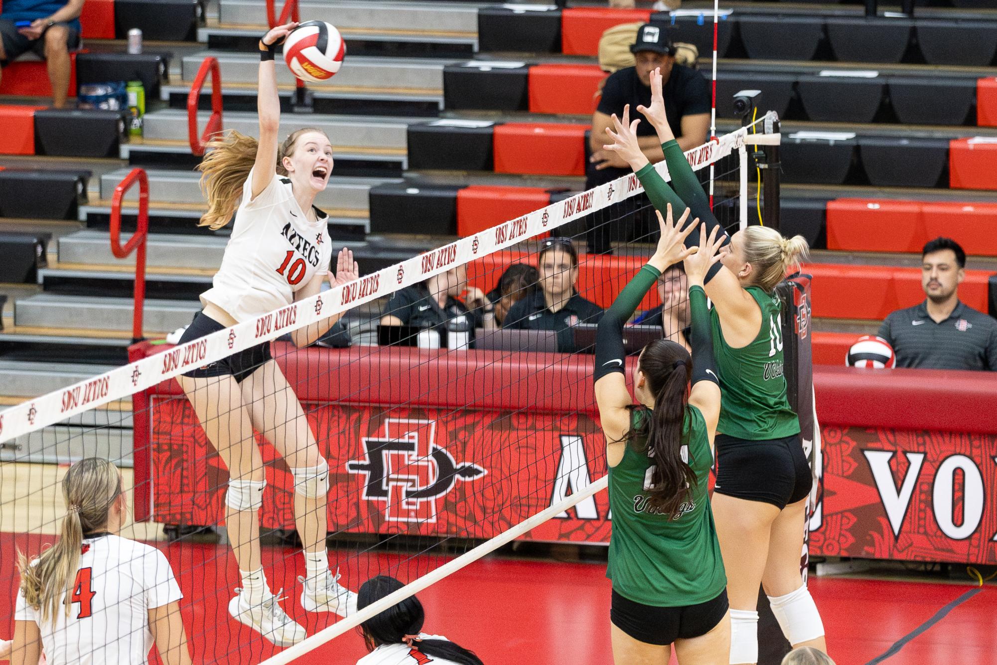 San Diego State outsider hitter and opposite hitter Taylor Underwood rises for a spike against Portland State on Friday, Sept. 6 at the Aztec Court inside the Peterson's Gym. 