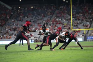 San Diego State linebacker Tano Letuli sacks Oregon State quarterback Gevani MccCoy at Snapdragon Stadium on Saturday, Sept. 7,  The Aztecs fell to the Beavers in a shutout 21-0. 