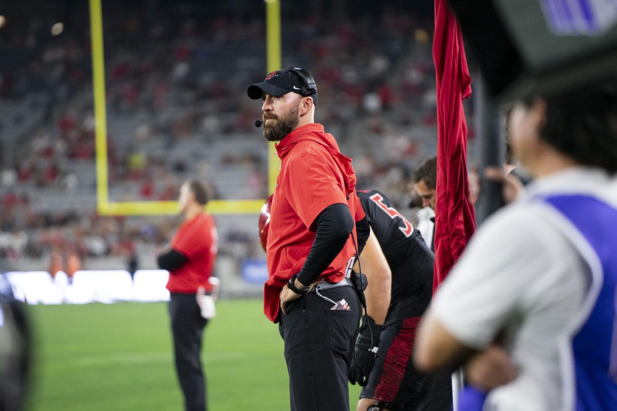 Head Coach Sean Lewis glances at the crowd during Aztecs matchup against the Oregon State Beavers at Snapdragon Stadium on Saturday, Sept. 7.