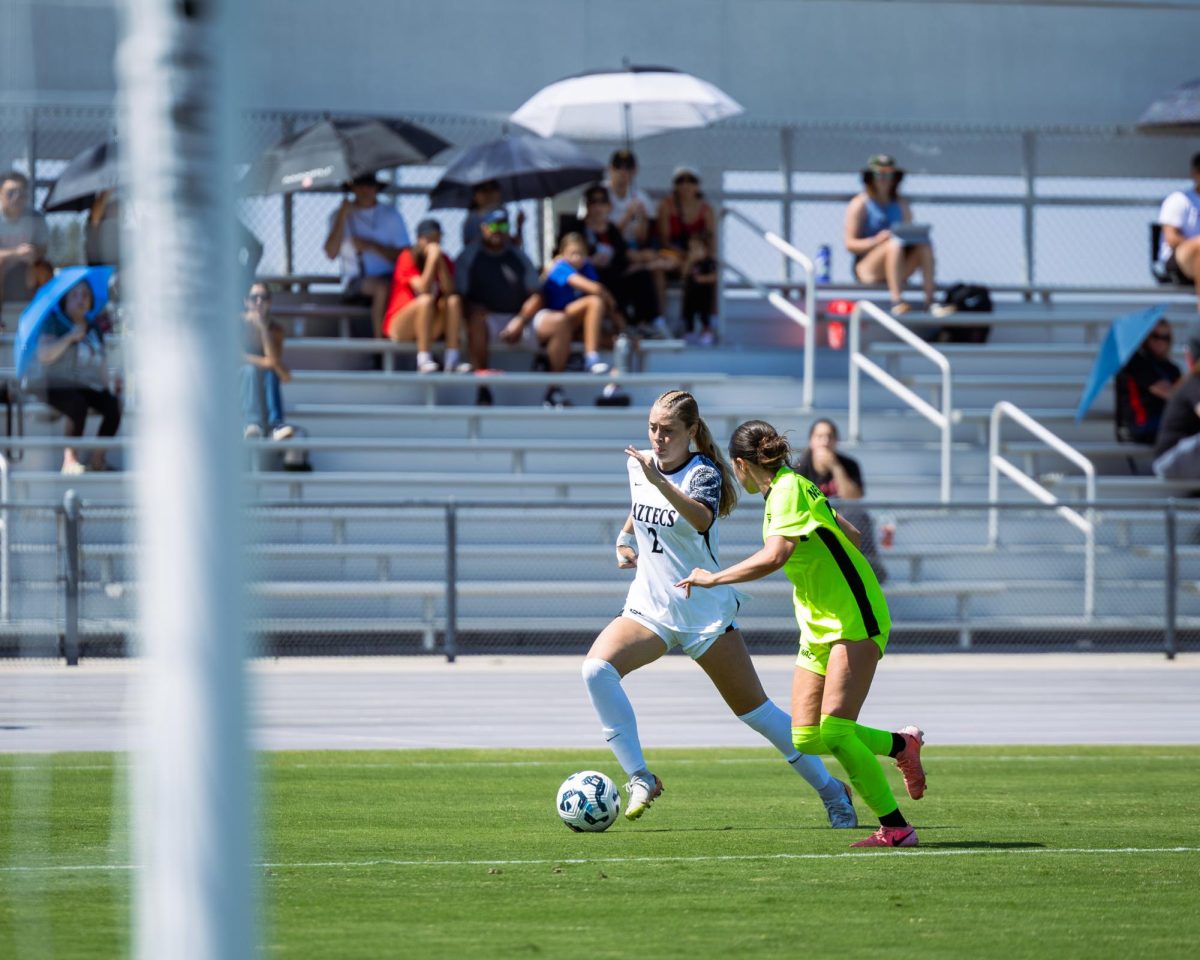 San Diego State forward Mia Lane dribbles down the field to set up a cross against Utah Valley on Sunday, September 22nd, at the SDSU SportsDeck.