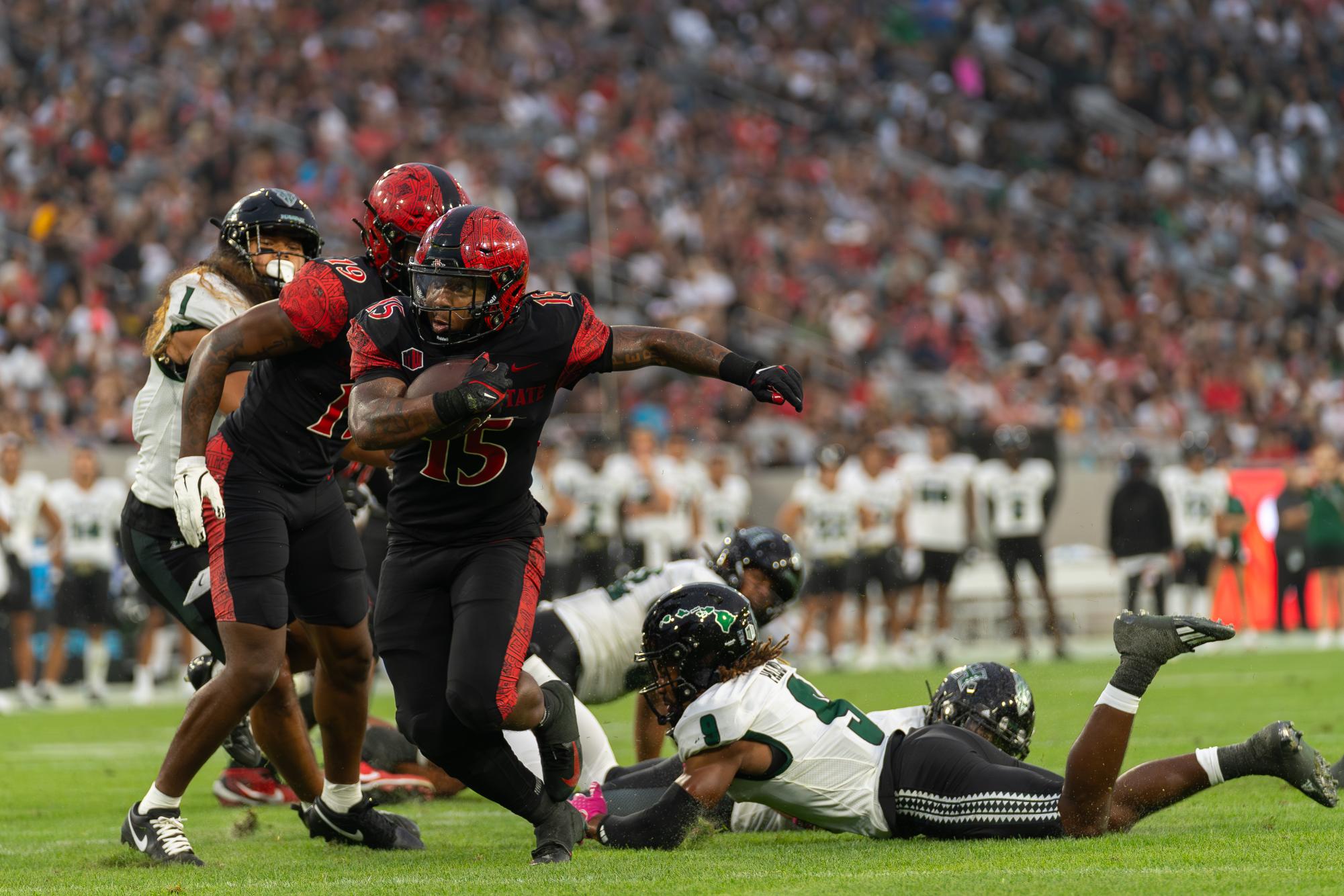 San Diego State running back Marquez Cooper rushes into the endzone for a touchdown against the Hawaii Rainbow Warriors at Snapdragon Stadium on Saturday October 5, 2024.