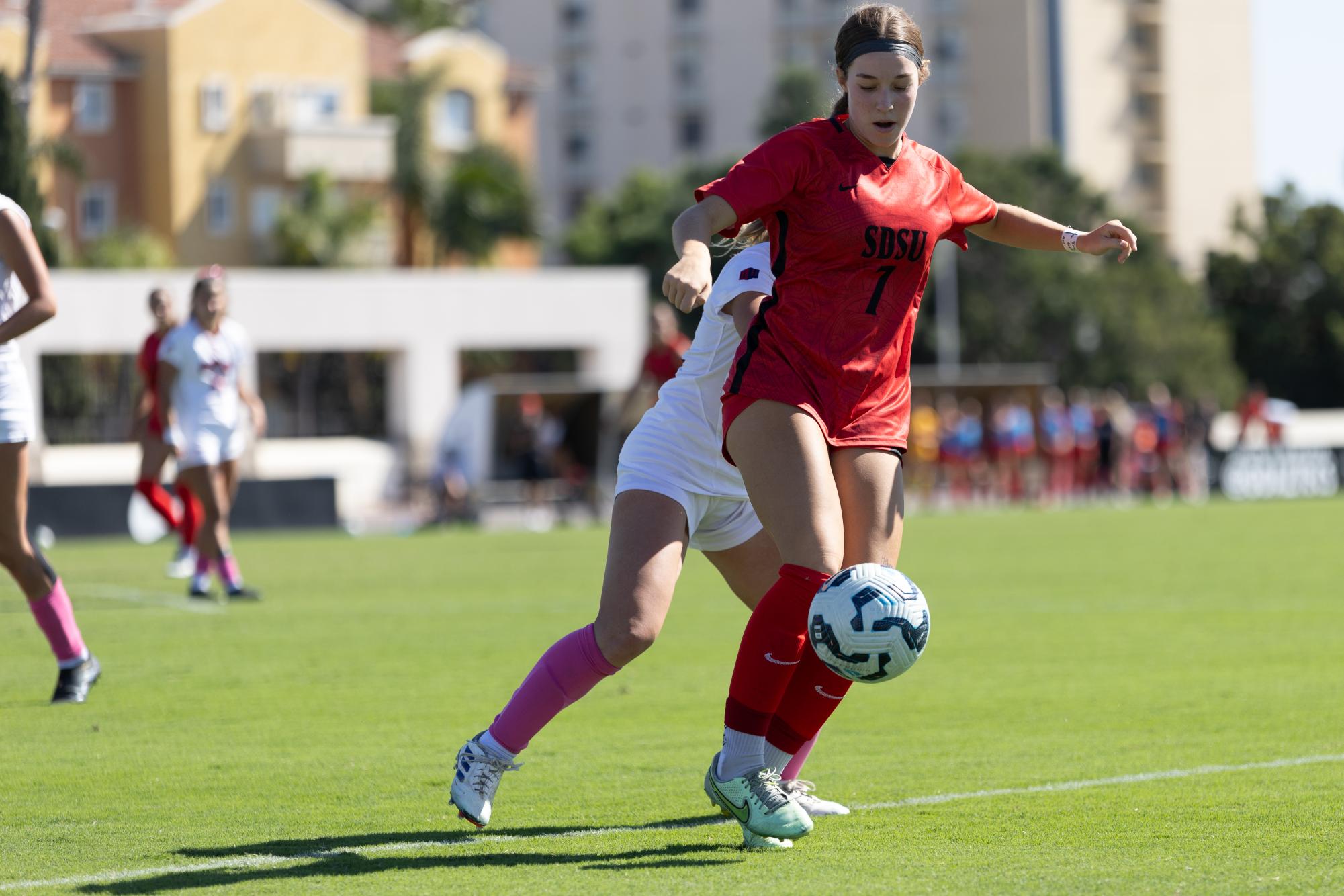 San Diego State midfielder Riley Gumm tries to fend off a Fresno State defender while controlling the ball just outside the penalty box on Sunday, Oct. 20 at the SDSU Sports Deck. “We weren't perfect by any stretch, but I thought we did a lot of things really well and being disciplined,” Friesen says. “How we were to play out of the back, how we defended, creating chances and really just create an environment for ourselves that we're more worried about doing the right things than the end result and the end result took care of itself.”