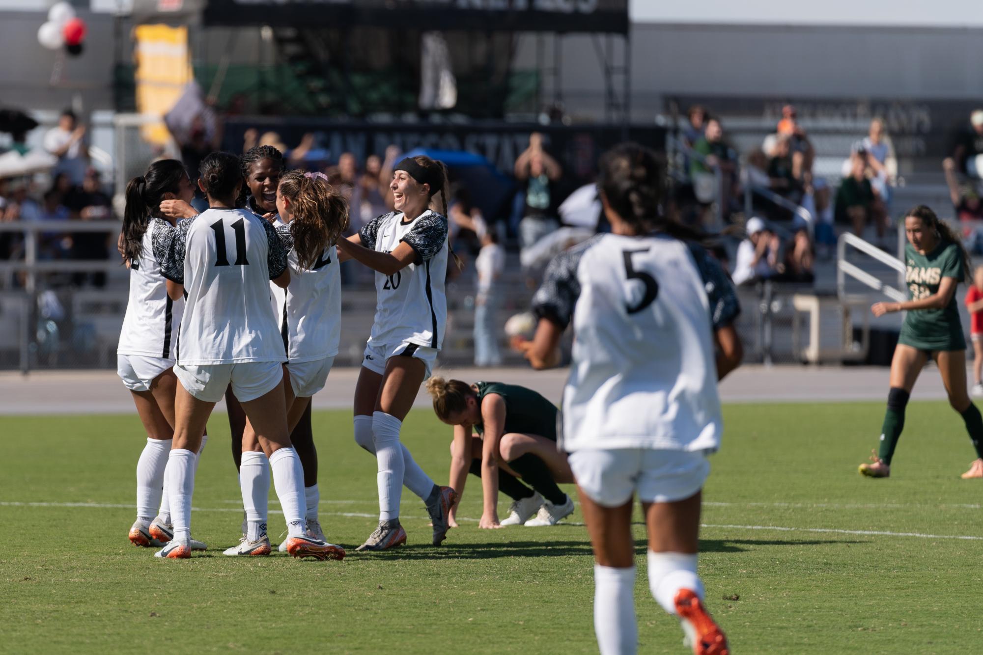 The San Diego State women's soccer team celebrates a late goal to give them the win against Colorado State at the SDSU Sports Deck on Sunday Oct. 27, 2024.  