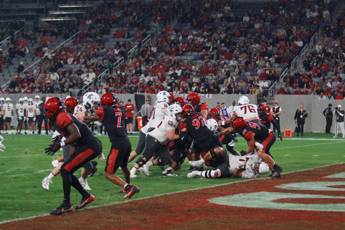 The San Diego State defense halts Washington State's offense just short of the goal line at SnapDragon Stadium.