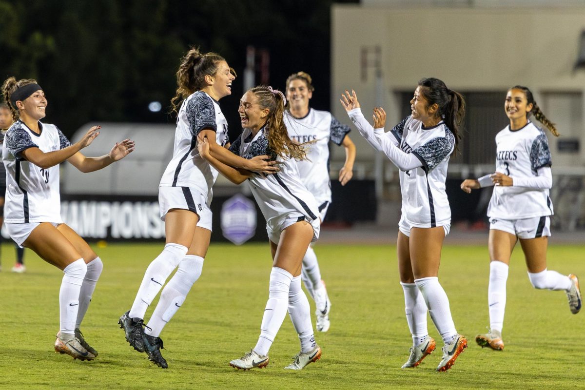 San Diego State forward Kali Trevithick celebrates with teammates after scoring from outside the 18-yard box against the UNLV Rebels on Sunday, Nov. 3 at the SDSU Sports Deck. Trevithick score two goal in this game to secure a 3-1 victory for the Aztecs.